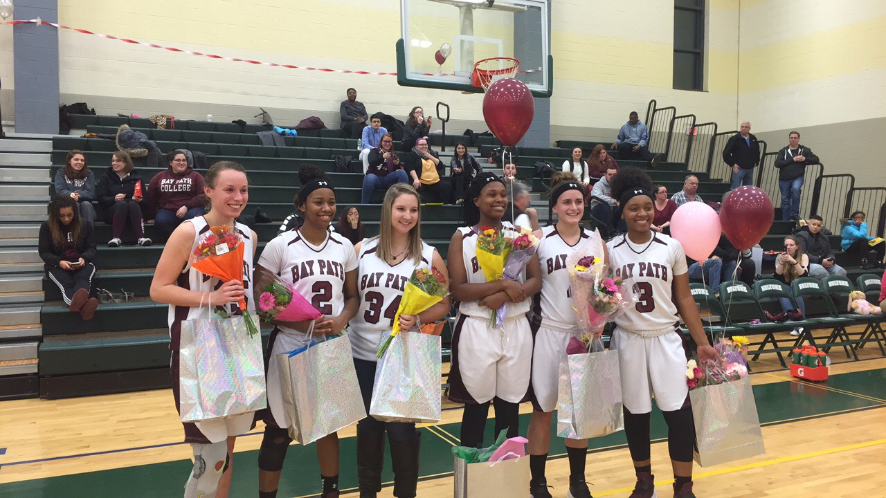 Jackson Scores 1,000th Point Leading Wildcats to a Senior Night Victory