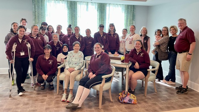 Bay Path Softball takes a break to Meet 1938 Alum and supporter
